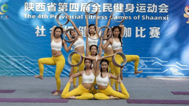 陕西省第四届全民健身运动会社会组健身瑜伽比赛在扶风县体育馆举行泛亚电竞(图3)